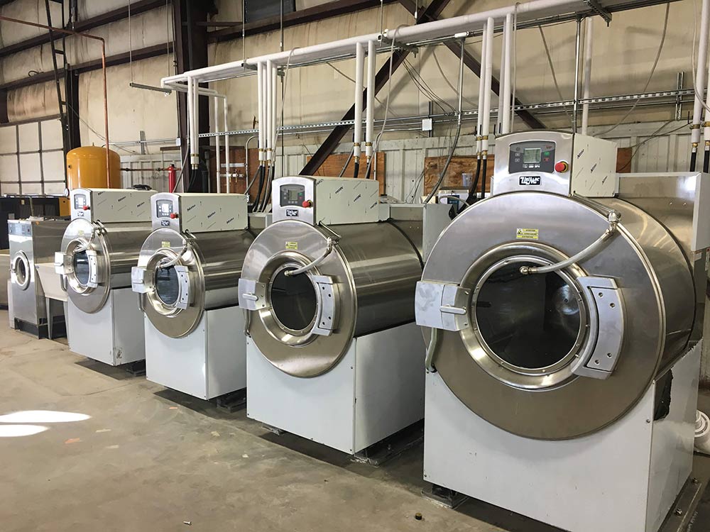 Custom machines for commercial laundry needs